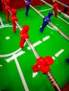 Foosball. Table with red and blue players detail perspective. Royalty Free Stock Photo