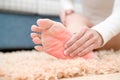 Foot ankle injury pain women touch her foot painful, healthcare and medicine concept