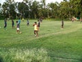 The boys are playing foot balls on the playground. Sports is a medium of physical exercise, foot ball is one of them Royalty Free Stock Photo