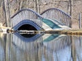 Foot Bridge Reflected in Still Water