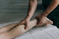 Foot calf massage. Lymphatic drainage massage.