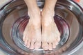 Foot care, Feet soak clean water in a container