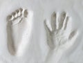 Foot and hand child imprints Royalty Free Stock Photo