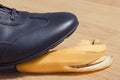 Foot in leather shoe before slipping on banana peel Royalty Free Stock Photo