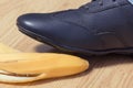 Foot in leather shoe before slipping on banana peel Royalty Free Stock Photo