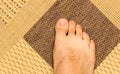 Foot man on the carpet Royalty Free Stock Photo