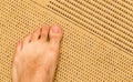 Foot man on the carpet Royalty Free Stock Photo