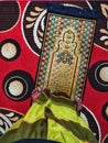 Foot of a man standing on a prayermat on the carpet Royalty Free Stock Photo