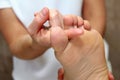 Foot massage details, close-up. Patient receiving foot massage. Royalty Free Stock Photo