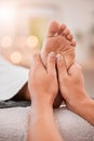 Foot massage, spa and woman client ready for feet healing, therapy and relax treatment. Physiotherapy, health clinic and Royalty Free Stock Photo