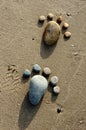 Foot, pebble, sand, art, beach Royalty Free Stock Photo