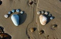 Foot, pebble, sand, art, beach Royalty Free Stock Photo