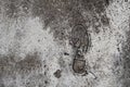 Foot print on grunge concrete texture