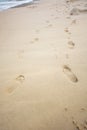 Foot print in sand beach Royalty Free Stock Photo