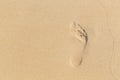 Foot prints on sand at the beach in the afternoon Royalty Free Stock Photo