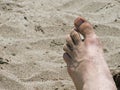 Foot in the sand