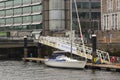 A 40 foot seagoing yacht moored to a floating deck at the entrance to the Port of Cork City Marina in the Republic of Ireland