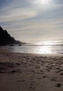 Foot steps on beach in sunrise Royalty Free Stock Photo