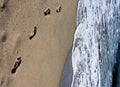 Foot steps in the sand Royalty Free Stock Photo