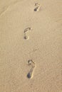 Foot tracks on sand, Boracay Island, Philippines