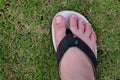 Foot wearing sandal