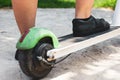 Foot of woman on electric scooter Royalty Free Stock Photo