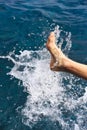 Foot of young man in water Royalty Free Stock Photo