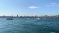 Footage of cruise tour boats and ferryboats passing on Bosphorus strait in Istanbul.