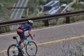 Cyclist climbing the hill in golden colorado