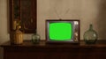 footage of Dated TV Set with Green Screen Mock Up Chroma Key Template Display, Nostalgic living room with furniture and old mirror