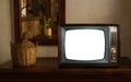 footage of Dated TV Set with white Screen Mock Up Chroma Key Template Display, Nostalgic living room with furniture and old mirror Royalty Free Stock Photo