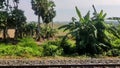 Footage of outside view from window of Indian moving train. Indian Railways Journey.