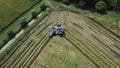 Footage in Rice farm on harvesting season by farmer with combine harvesters