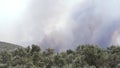 Footage of Wildfire with smoke in the forest at at Mazi village Mugla Bodrum Turkey Summer 2021. T