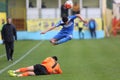 Football action - sliding tackle Royalty Free Stock Photo