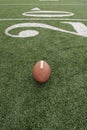 Football along the twenty yardline Royalty Free Stock Photo