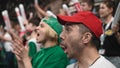 Hockey couple betting fan sport stands arena. Score goal joy. People watch game. Royalty Free Stock Photo