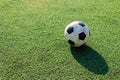 Football on artificial turf. It is for green background in a stadium Royalty Free Stock Photo