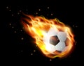 Football ball falling in flame blaze,soccer ball with fire tongues Royalty Free Stock Photo