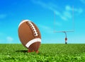 Football Ball on Kicking Tee with Goal Post Royalty Free Stock Photo