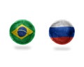 Football balls with national flags of brazil and russia.