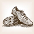 Football boots hand drawn sketch style vector