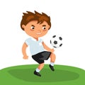 Football boy Runs attacking, passes passes, active dynamic, movements. kid play with soccer ball. running school child playing in Royalty Free Stock Photo