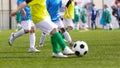 Football Boys Kicking Ball in Opposite Teams. Young Soccer Players Running in Duel and Playing Soccer Tournament Match Royalty Free Stock Photo