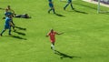 Football Championship: Red Team Forward Shoots: Kicks the Ball and Scores the Goal. Goalkeeper Fails