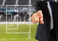 Football coach drawing a soccer tactic Royalty Free Stock Photo