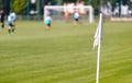 Football Corner White Flag. Soccer Turf Pitch in a Blurred Background Royalty Free Stock Photo