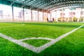 Football Corner line on green artifact grass of soccer indoor pitch
