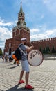 Football fan of Poland with a drum on Red Square in Moscow Royalty Free Stock Photo