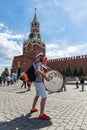 Football fan of Poland with a drum on Red Square in Moscow Royalty Free Stock Photo